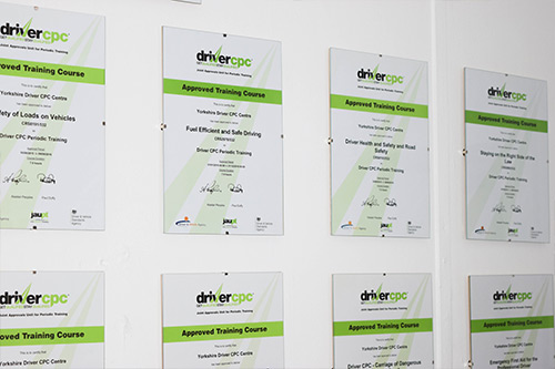 Certificates hanging on a wall