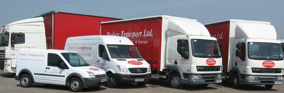 Group of vehicles including lorries and vans